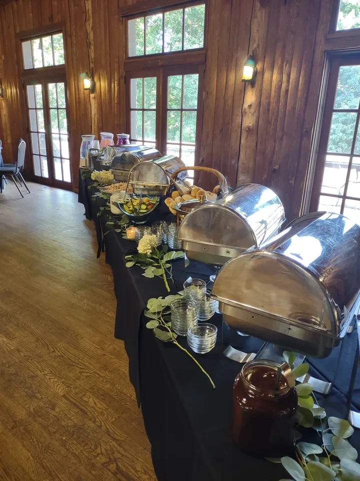 Catering buffet with chafing dishes at venue