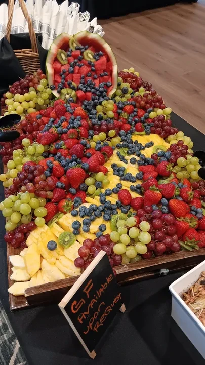Elaborate fresh fruit display with watermelon centerpiece