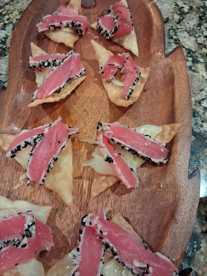 Seared tuna appetizers on wonton crisps